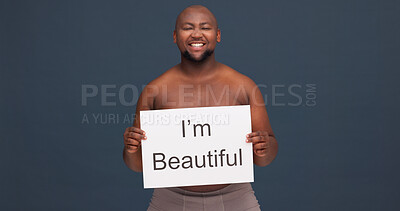 Buy stock photo Happy man, portrait or paper sign for body positivity with pride, topless or self love at studio space. Plus size model, African or excited on dark background with poster acceptance or voice in Kenya
