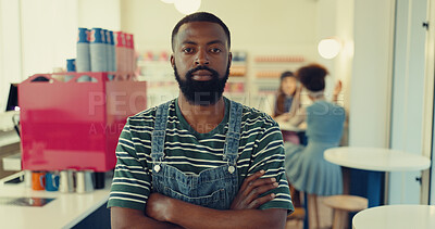 Buy stock photo Black man, portrait and barista with confidence for customer service, career or job at coffee shop. African, male person or serious waiter with arms crossed for caffeine industry at indoor restaurant
