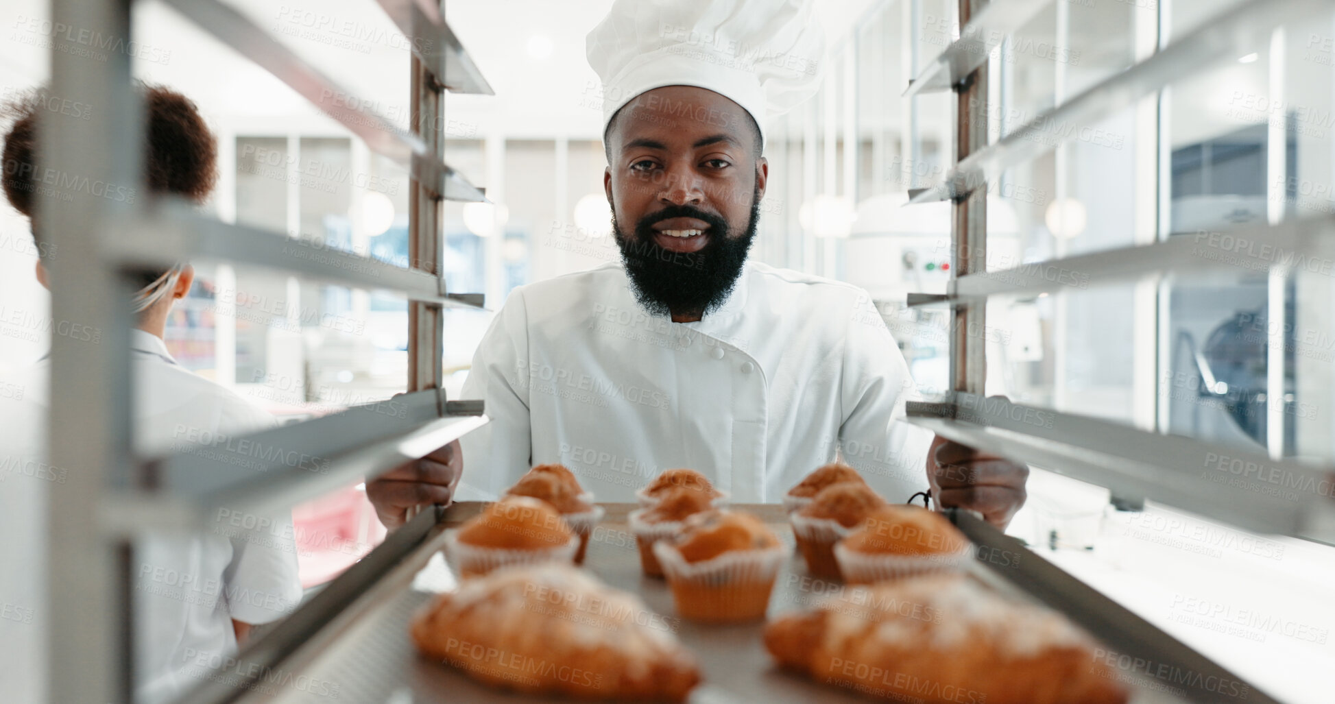 Buy stock photo Muffin, bakery and portrait with man in kitchen for coffee shop, food industry and breakfast. Shelf, chef and nutritionist with male baker and dessert in restaurant for baking, cafe and order
