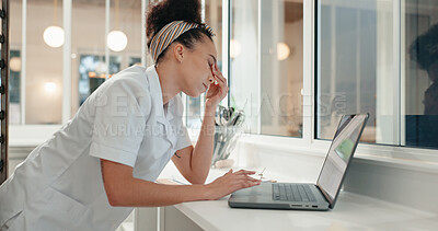 Buy stock photo Research, tired and laptop with chef in kitchen for online recipe, restaurant review and stress at night. Fatigue, menu planning and frustrated with person in coffee shop for social media and burnout