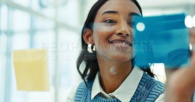Buy stock photo Research, glass wall and businesswoman with creative planning with notes in office for project. Brainstorming, board and female event designer working on startup ideas for development in workplace.