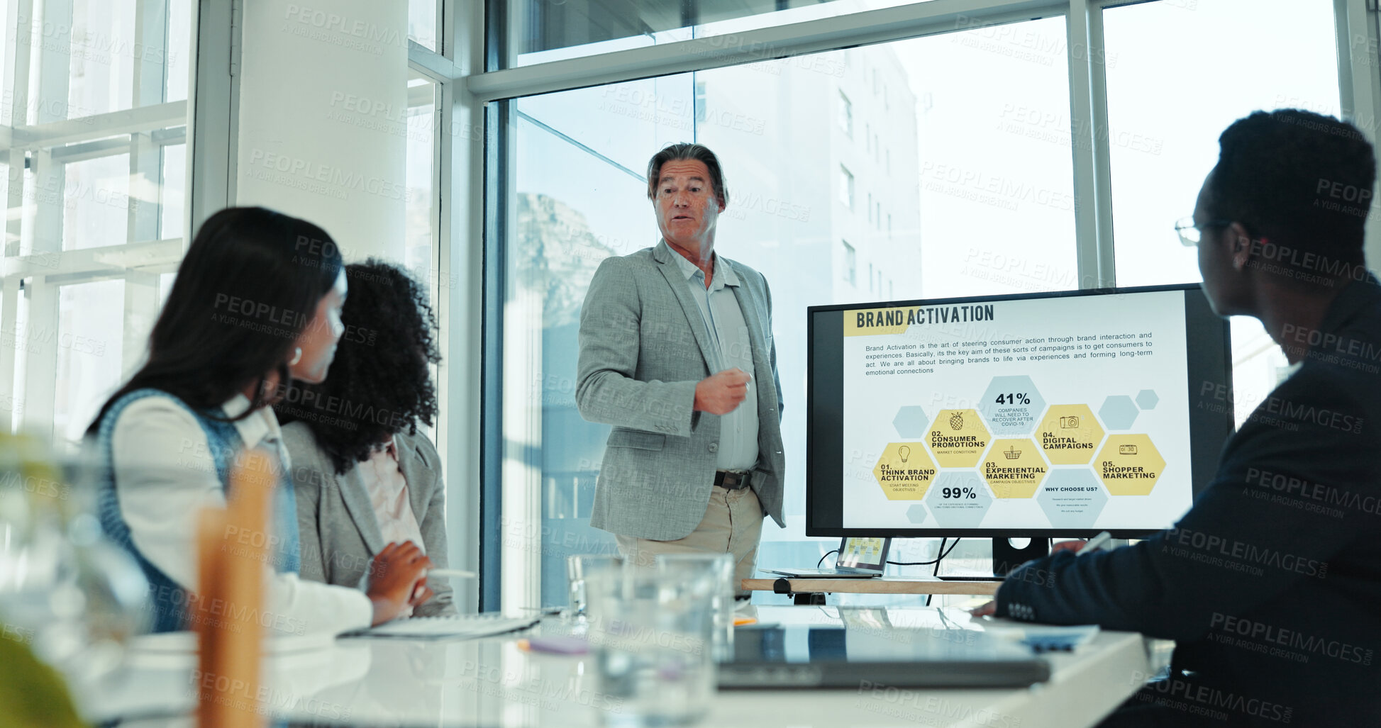 Buy stock photo Brand activation, computer screen and training with business people in boardroom for coaching. Marketing, mindmap or presentation and man speaking in office for upskill workshop with employee team