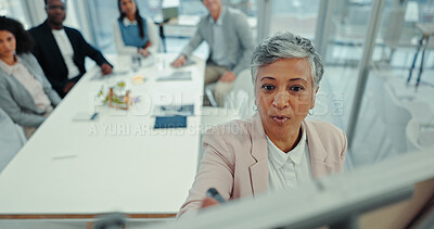 Buy stock photo Coaching, presentation and mature with business woman in meeting for workshop, brainstorming and public relations. Clients, project management and media campaign with people in office for proposal