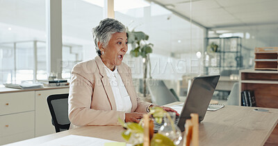 Buy stock photo Surprised, mature woman and notification for success, alert and excited with funding and celebration. Office, shocked and person with laptop, winner and entrepreneur with investment for business
