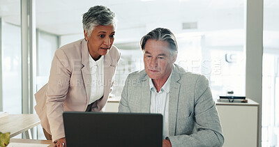 Buy stock photo Collaboration, laptop and review with business people at desk in office together for management. Computer, experience and feedback with colleague team in workplace for conversation or discussion