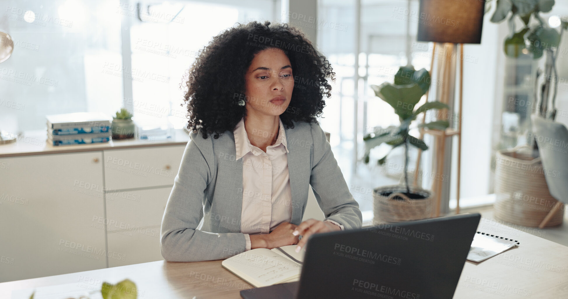 Buy stock photo Accounting, laptop and notebook with business woman at desk in office for bookkeeping report. Computer, finance and thinking with professional accountant in workplace for financial management