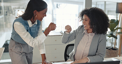 Buy stock photo Happy, business women and fist bump with teamwork for winning, celebration or good job at office. Female people, employees or colleagues with touch or smile for well done, great news or productivity