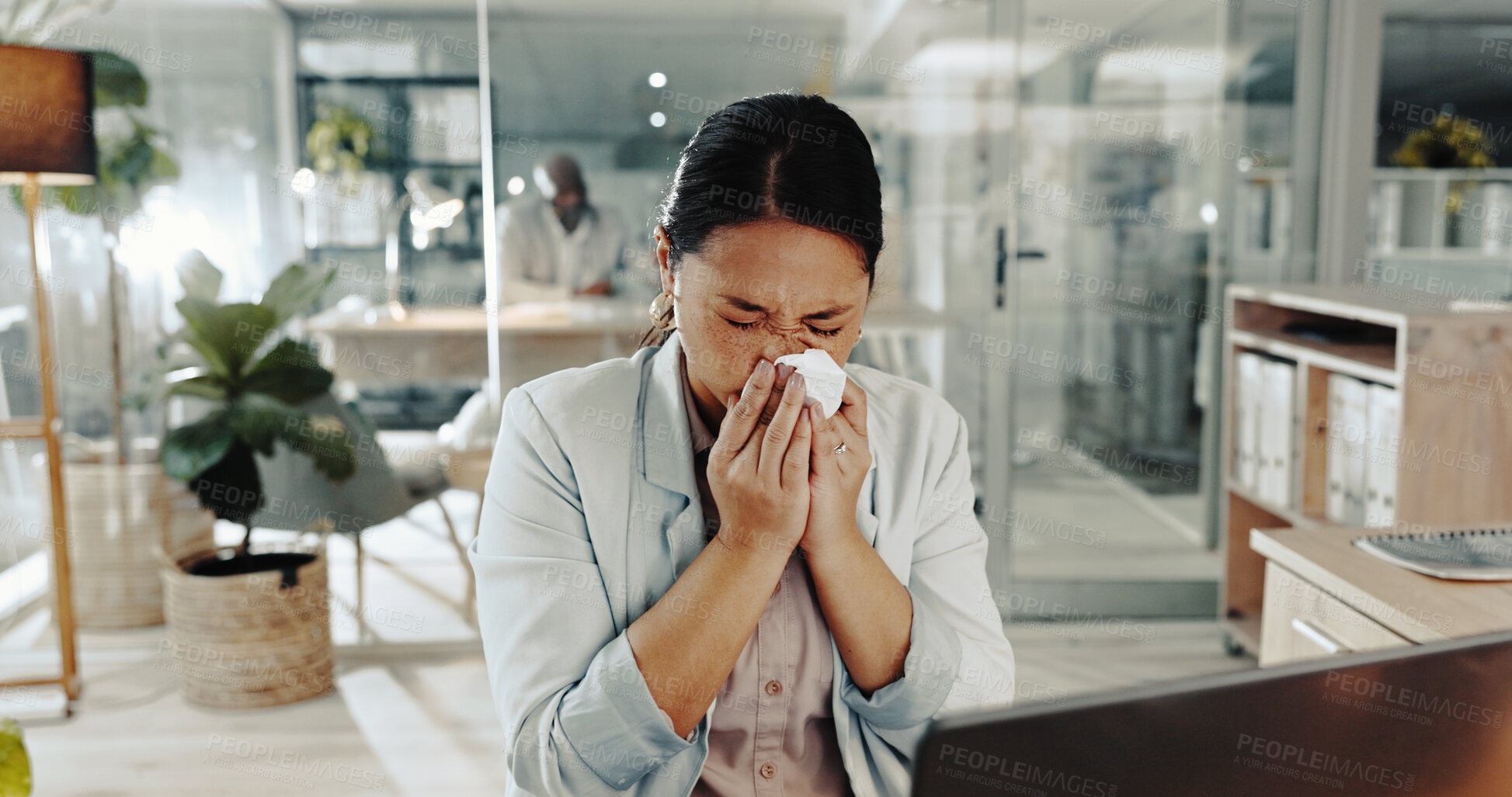 Buy stock photo Sick, asian woman or blowing nose with tissue for viral infection, hayfever or allergies at office desk. Frustrated, female person or employee with virus, cold or flu for influenza, cough or sneeze