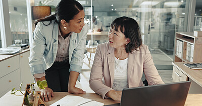 Buy stock photo Collaboration, feedback and laptop with business women at desk in office together for assistance. Computer, research and review with colleague people in workplace for conversation or discussion