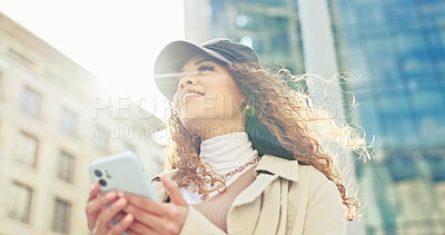 Buy stock photo Travel, low angle and phone with woman in city for direction, location app and thinking. Social media, search and online map with person and mobile in Brazil for navigation, network and adventure