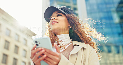 Buy stock photo Thinking, low angle and phone with woman in city for direction, location app and travel. Social media, search and online map with person and mobile in Brazil for navigation, network and adventure