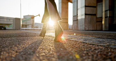 Buy stock photo Business, walking and shoes of woman in city with sunrise, travel and metro station for transport. Sunshine, urban sidewalk and feet of businesswoman on morning commute with light flare on ground