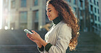 Mobile, typing and business woman in city for text, check schedule or reading email for zoning regulation. Phone, outdoor and happy worker on chat app, urban planning and project development online
