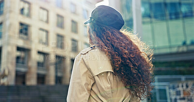 Buy stock photo Outdoor, business and woman with commuting in city to workplace for job opportunity. Back view, female person and walk in street or downtown for traveling as professional occupation for career growth