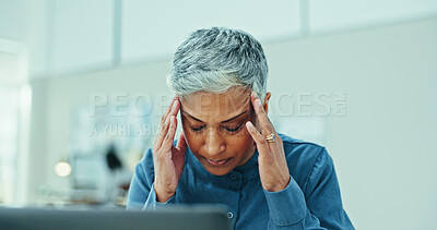 Buy stock photo Mature, frustrated woman or stress with headache for pressure, deadline or overworked at office. Senior, female person or employee with migraine or pain for anxiety, vertigo or dizziness at workplace