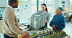Business people, architect and team with 3D model for industrial development, project structure or floor plan at office. Group, employee or interior designers with prototype for meeting at workplace