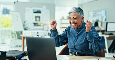 Buy stock photo Mature woman, celebration and winning with laptop for good news, promotion or email at office. Excited, female person or employee with smile on computer for amazing offer, deal or prize at workplace