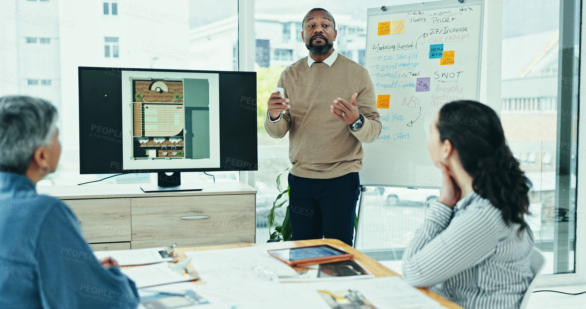 Buy stock photo Businessman, discussion or meeting with screen for presentation, interior design or floor plan at office. Man, architect or designer talking with team or display for renovation or construction layout