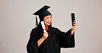 Woman, university graduation and smile with scroll on selfie for memories, profile picture and social media. Asian person, studio background and happy for certificate with celebration of achievement