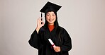 Ok, graduation and diploma with portrait of asian woman in studio for success, college degree or award. Achievement, education and university student with person on white background for mockup space