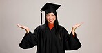 Hands, graduation and choice with portrait of asian woman in studio for success, college degree or decision. Option, education and university student with person on white background for mockup space