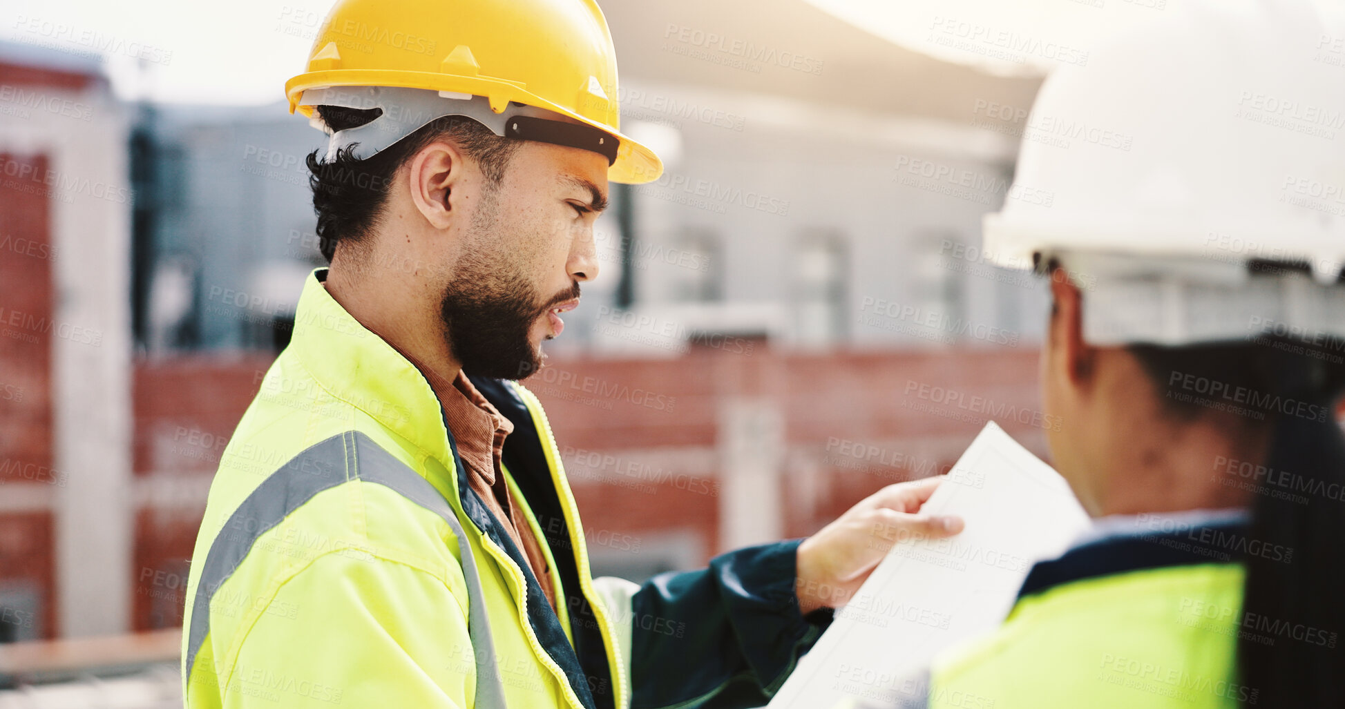 Buy stock photo Reading, construction site or people with blueprint for inspection, urban development or planning in city. Man, woman or contractors with floor plan paperwork for town building layout or architecture
