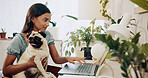 Dog, freelancer and laptop with woman in home office for social media, communication and pet adoption blog. Research, animal rescue and website with person or remote worker for writer and online post