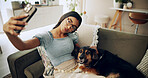 Relax, dog and selfie with woman on sofa for bonding, social media post and pet adoption. Photography, pout and animal rescue with person in living room at home for foster care, picture or online app