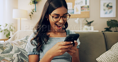 Buy stock photo Excited, phone and success with woman on sofa for bonus, online shopping deal and achievement. Good news,  social media post and celebration with person in living room at home for happiness and wow