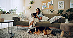 Woman, living room and dog with tablet, reading and online in bonding for love, companion and peace. Female person, tech and pet care for emotional support in home for happiness, streaming or relax