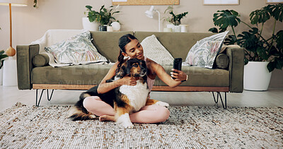 Buy stock photo Hug, house and woman with dog, selfie and bonding together with best friend in living room. Apartment, person and girl on carpet, embrace and cheerful with service animal, joyful and profile picture