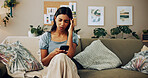 House, stress and woman with cellphone, headache and mistake with communication. Person, apartment and girl on couch, illness and smartphone with migraine, online reading and sick with error message