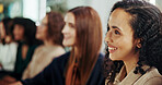 Smile, audience and conference with business woman in office for seminar, listening and acquisition opportunity. Workshop, asset valuation and training with employees at convention for planning