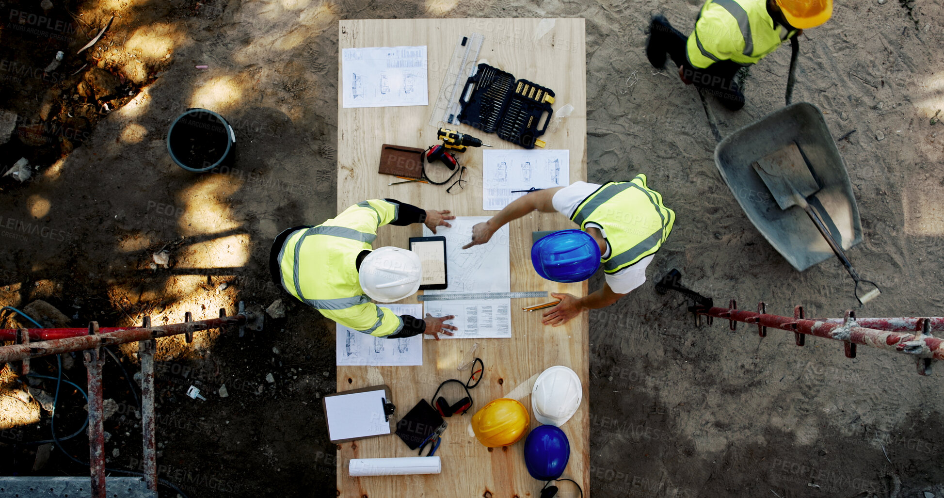 Buy stock photo Blueprint, construction and men at table with planning, collaboration and site inspection paperwork from above. Architect, building team and contractor with layout, pointing and project management