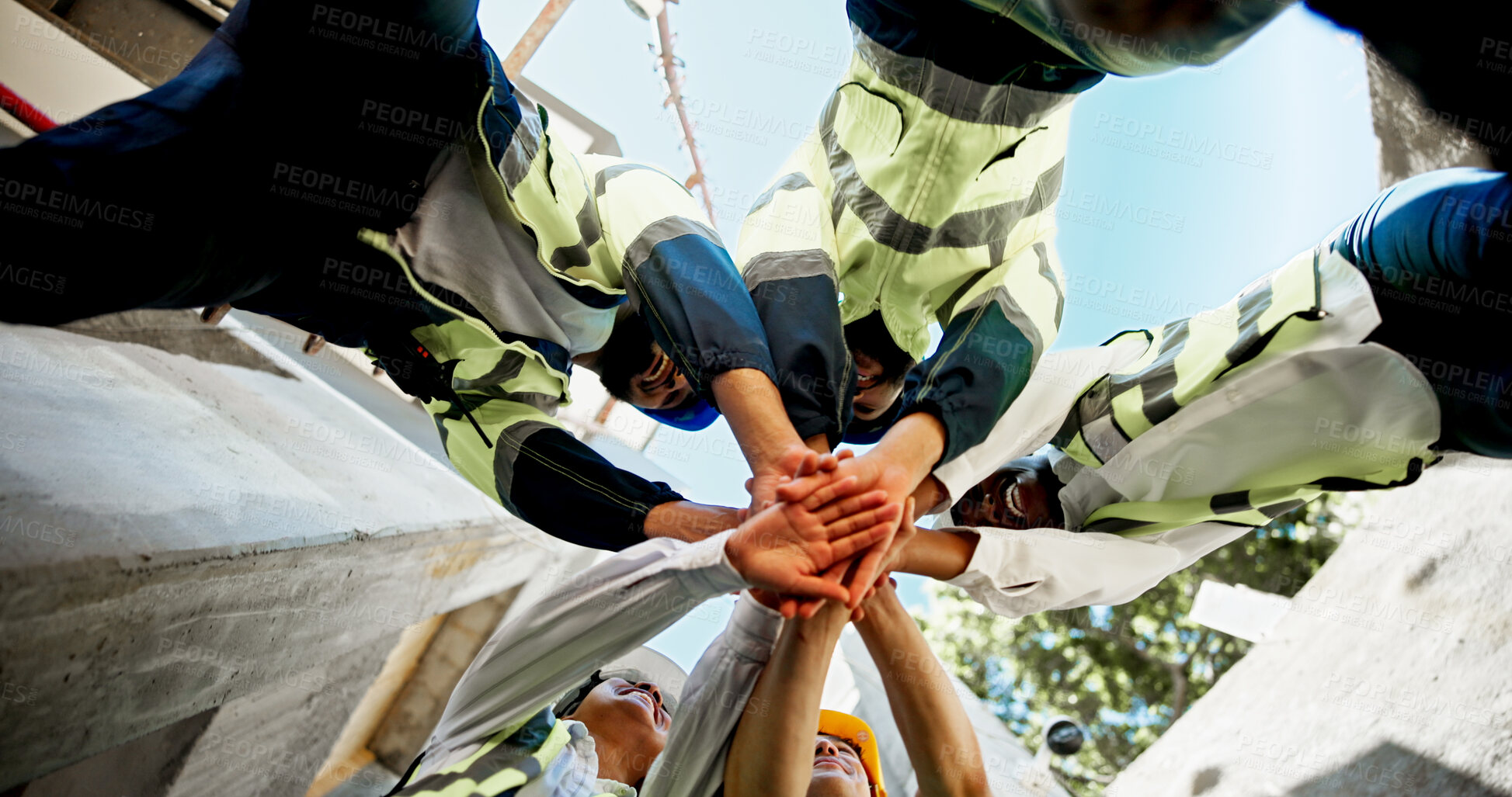 Buy stock photo Construction, teamwork and hands together on site for support with building inspection and compliance success. Below, worker stack and people with celebration for project management and cooperation