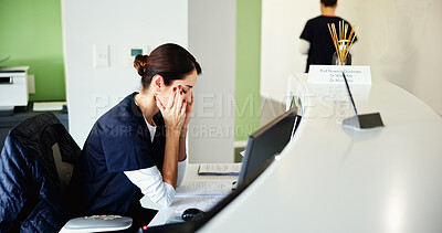 Buy stock photo Headache, stress and woman receptionist at medical office for burnout, overworked and tension. Professional, healthcare and person at front desk with fatigue, frustrated and upset for administration