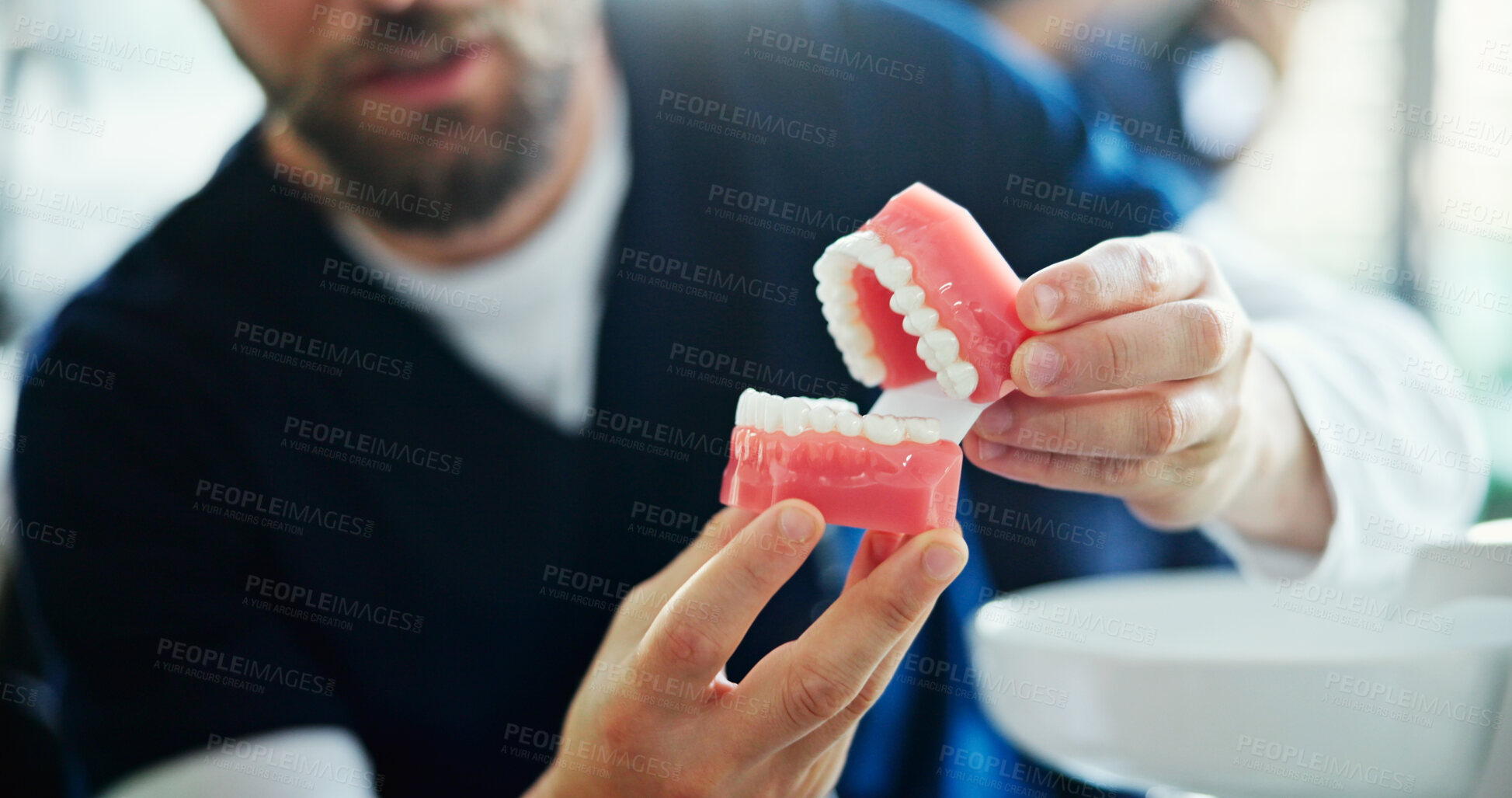 Buy stock photo Man, hands and dentist with mouth mold for dental hygiene, healthcare or surgery consultation at hospital. Male person, medical employee or orthodontist with clay teeth for oral, gum or tooth exam