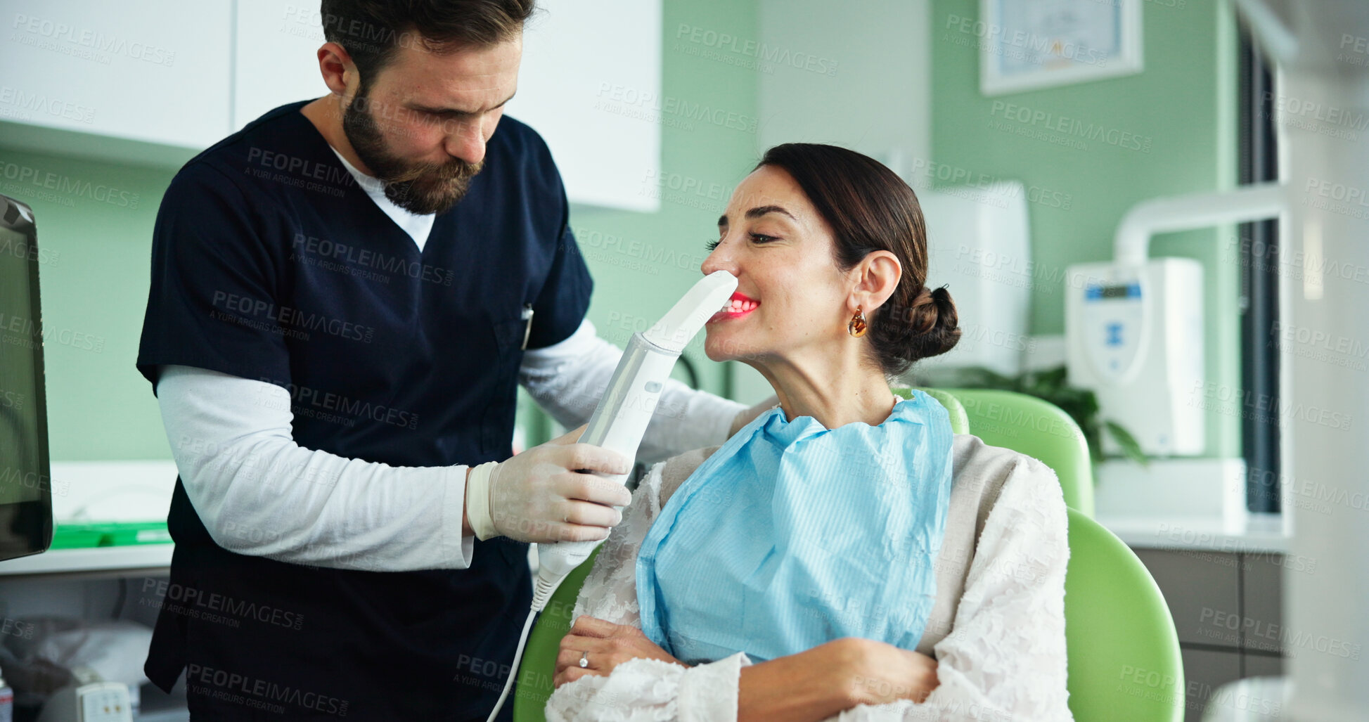 Buy stock photo Happy woman, dentist and scanner with patient for dental exam, test or results at hospital. Female person, client or customer with orthodontist for mouth examination, oral ultrasound or healthcare