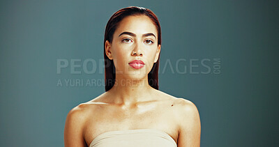 Buy stock photo Woman, portrait and confident for skincare in studio background for results in Mexico. Female person, beauty and serious with glowing for transformation, body care and skin treatment or routine