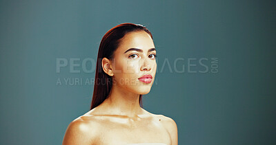 Buy stock photo Woman, portrait and serious for skincare in studio background with or satisfied with results. Female person, beauty and glow with confidence for transformation, facial and skin treatment or routine