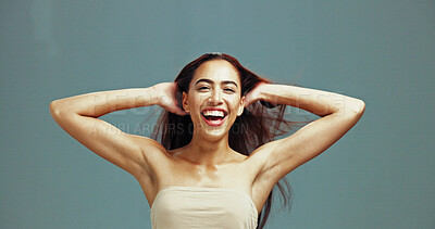 Buy stock photo Excited, hair care and portrait of woman with beauty in studio, growth and texture on background. Hairstyle, face and model in makeup cosmetics for keratin treatment, aesthetic and laughing at salon