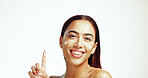 Portrait, happy woman or face cream skincare on finger for moisturizer cosmetics, beauty or glow. White background, studio or model with facial product, antiaging treatment or sunscreen in Brazil
