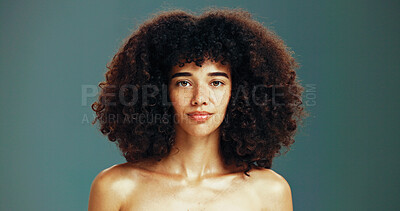 Buy stock photo Portrait, confident and woman with afro hair care, studio and treatment for wellness and health. Face, growth or proud girl model with beauty, volume and natural texture on green background in Brazil