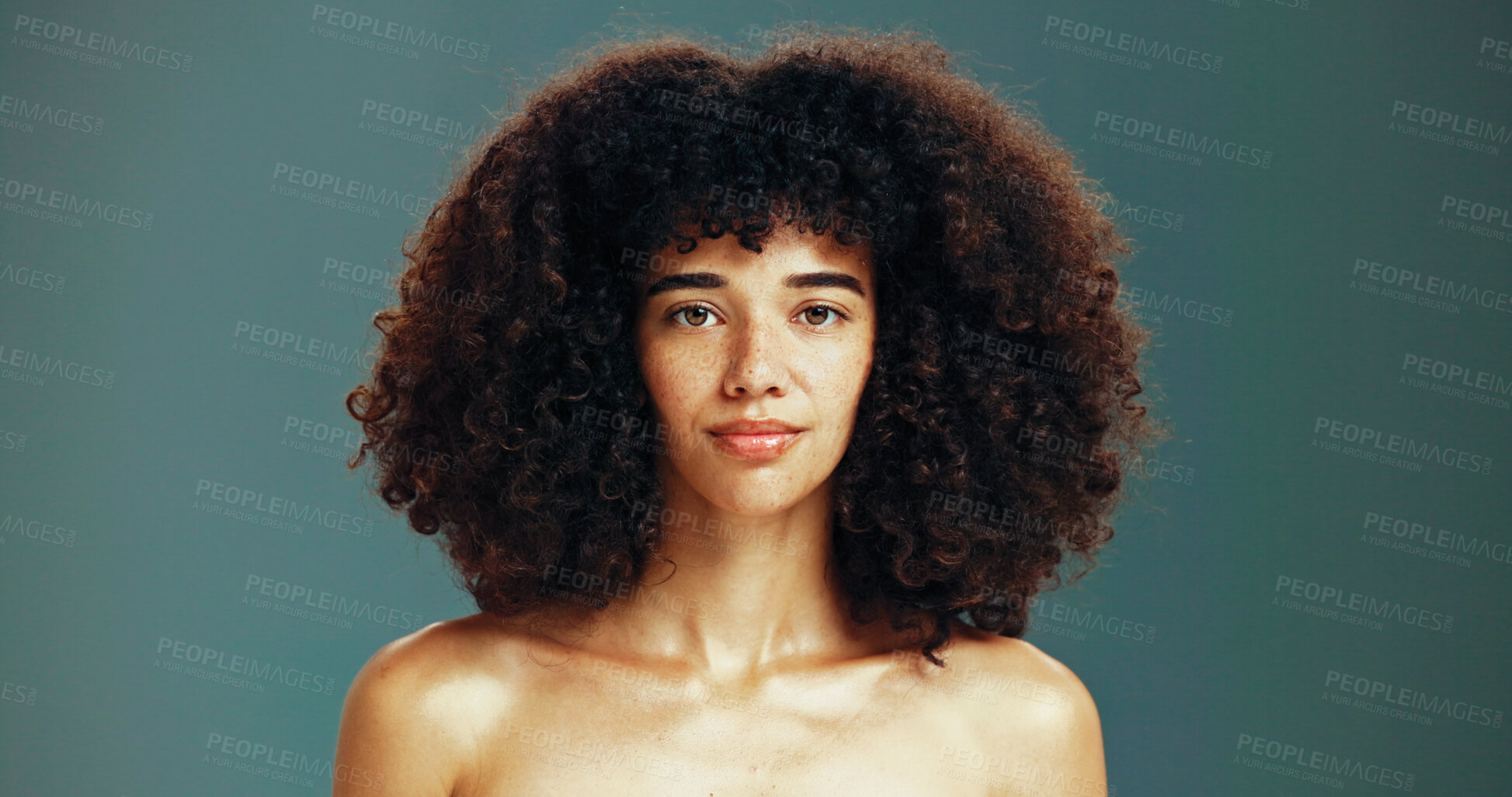 Buy stock photo Portrait, confident and woman with afro hair care, studio and treatment for wellness and health. Face, growth or proud girl model with beauty, volume and natural texture on green background in Brazil