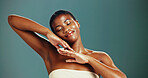 Relax, studio and skincare for woman, smile and treatment for antiaging, shine and benefits for glow. Green background, happy and dermatology for black person, moisture and healthy skin in space
