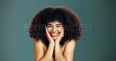 Buy stock photo Portrait, beauty and excited woman with afro hair care, studio and treatment for wellness and health. Face, growth and happy model with smile, volume and natural texture on green background in Brazil