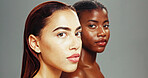 Studio, portrait and skincare for women, shine and treatment for glow, confident and cosmetics for antiaging. Grey background, diversity and dermatology for exfoliation of skin, friends and people