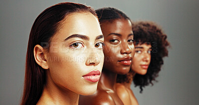 Buy stock photo Women, inclusion and confident for skincare in studio background for diverse beauty. Natural, people and serious or proud with glow on portrait in row for empowerment, body care and skin treatment