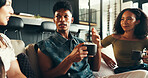 Bonding, conversation and friends with coffee, home and listening to gossip, couch and drinks in living room. Happy, talking and relax in lounge, tea and together in weekend, smile or people in house