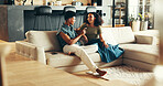 Happy couple, smile and talking in living room in bonding together, relax or peace on couch in home. Woman, man and conversation with healthy communication on weekend as discussion, chatting and love